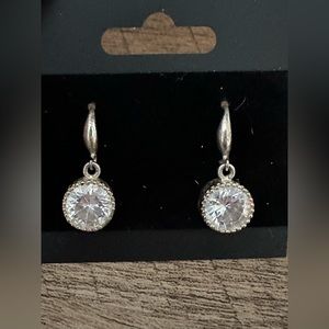 Silvertone crystal drop earrings with crystal accents.
